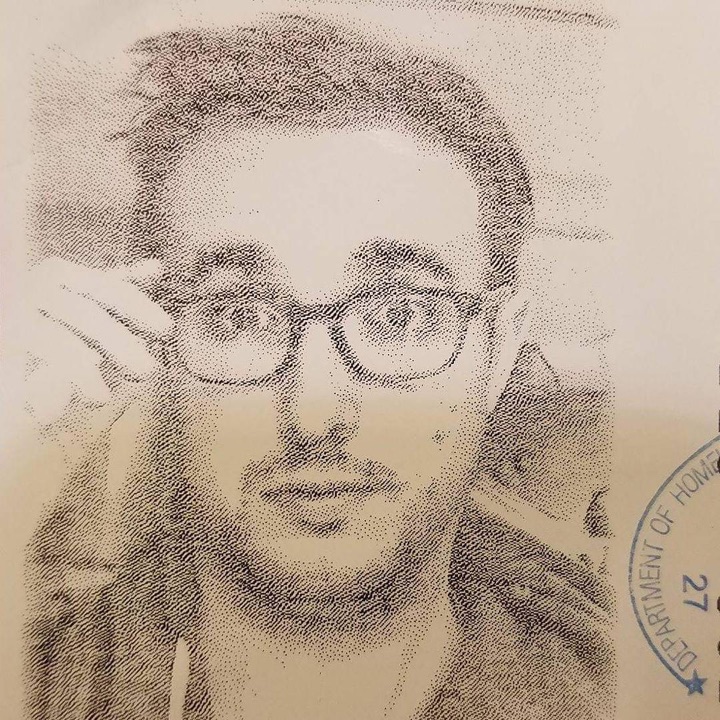 Richard Holcomb, a photocopied passport-style portrait